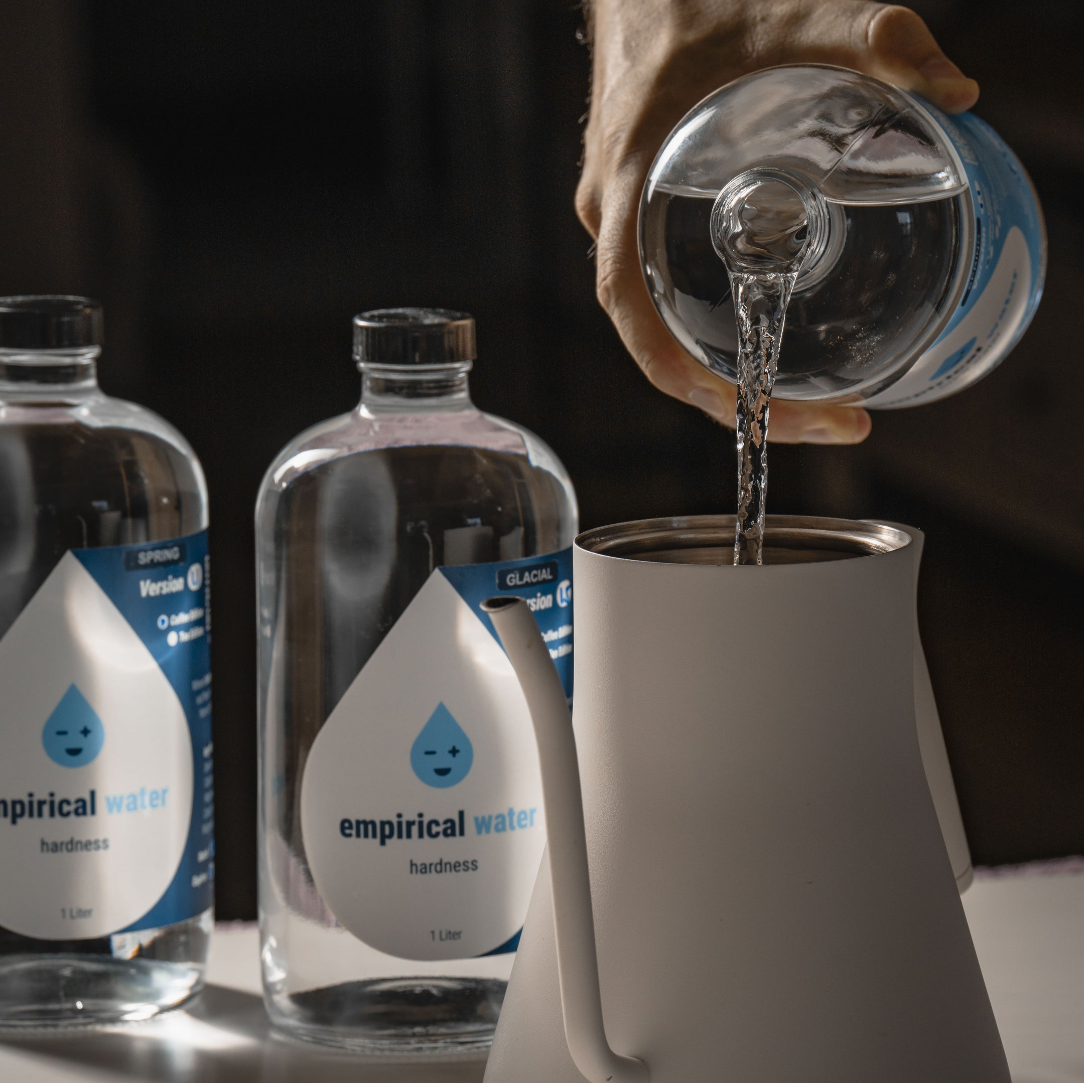 pouring the best water for coffee in a kettle